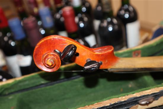 A German three-quarter size violin and bow, cased